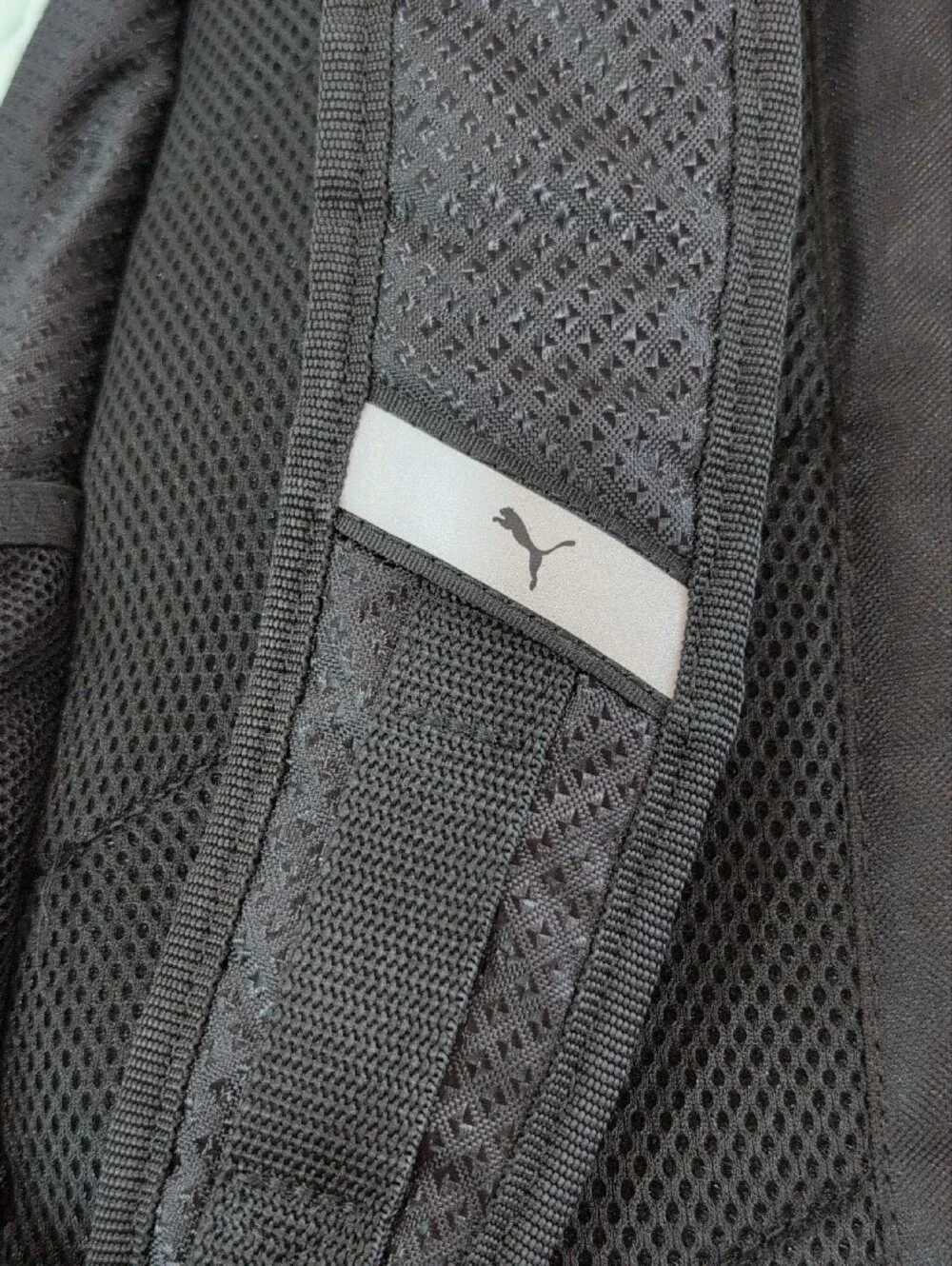 Puma Black Backpack with Coral Logo Accent